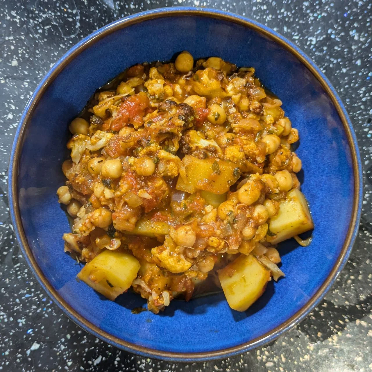 Cauliflower, potato and chickpea curry